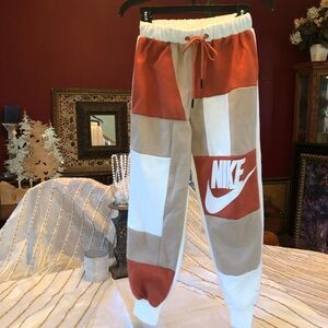 Nike Patchwork Jogger Pants in Orange, Beige & White size small EUC